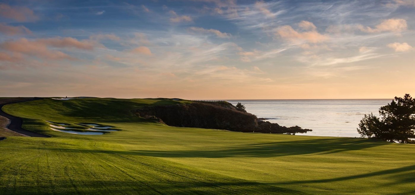 The vibrant green lawn of coastal golf links